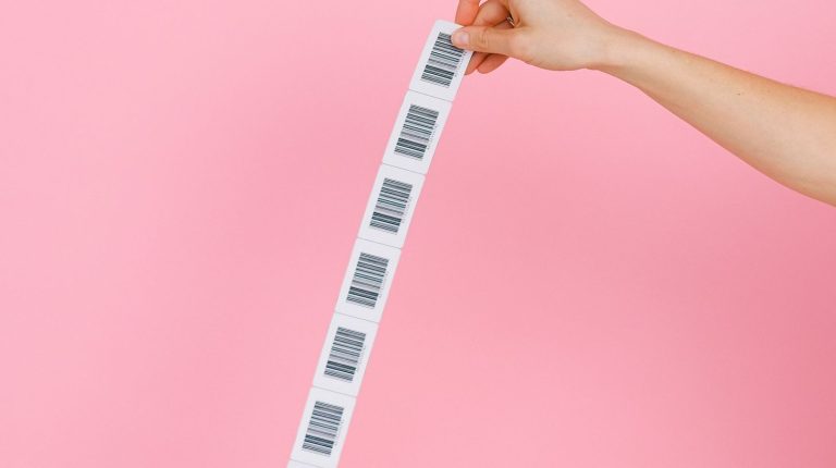 Barcode verification of freshly printed barcode labels held in hand