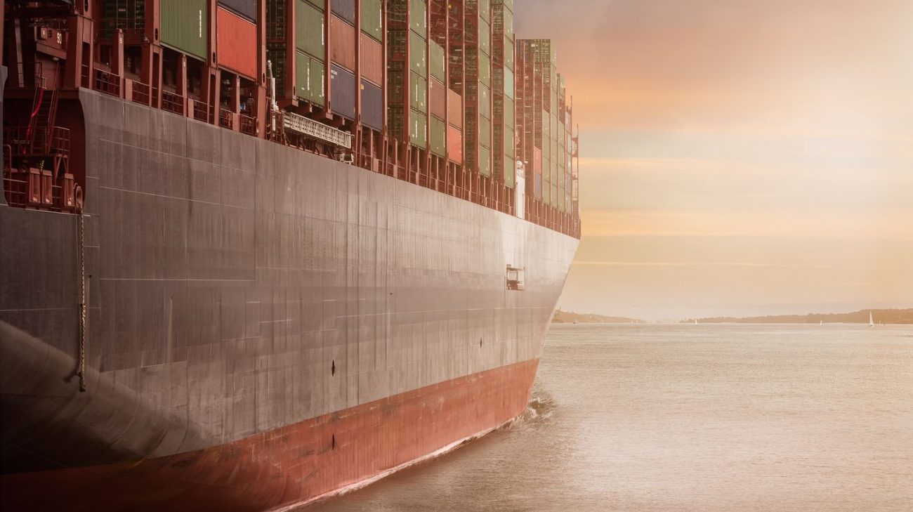 Container ship carrying drummed chemicals that need BS 5609 marine grade labels