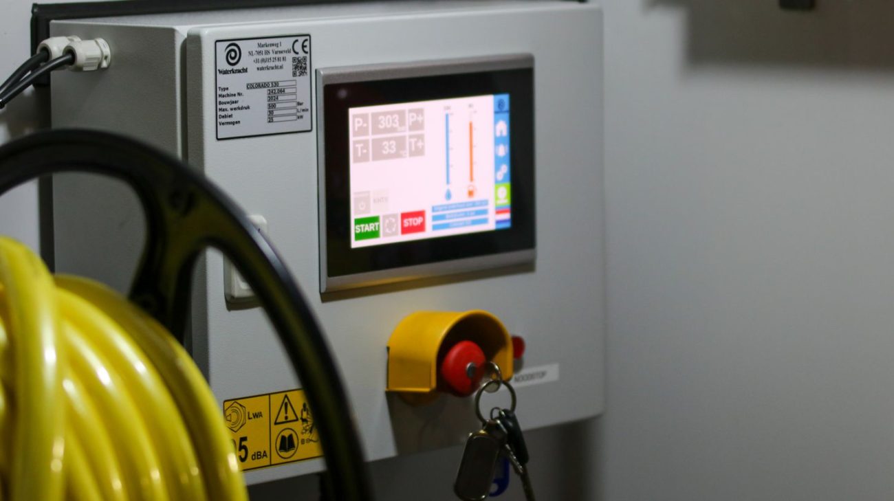Control panel showing the print settings behind a faded code