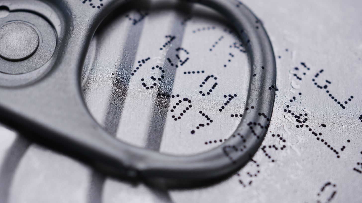 Date and lot coding printed directly onto a beverage container lid