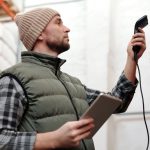 Checking RFID read rate with a handheld reader in a warehouse aisle